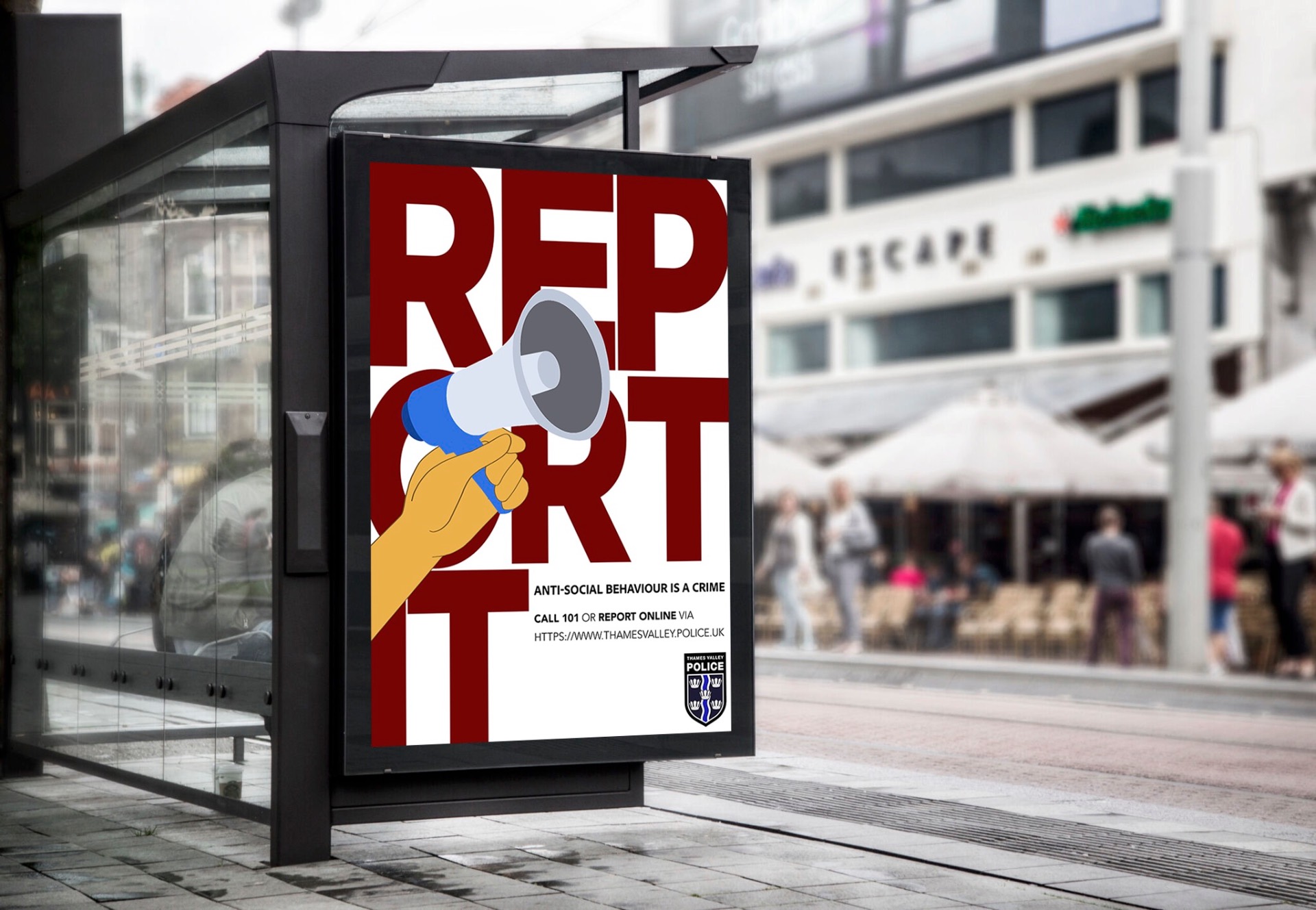 Thames Valley Police report it poster displayed in a bus shelter on a city street